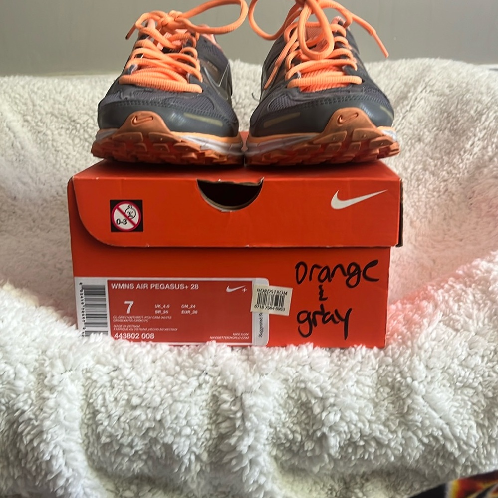 Nike Air Pegasus in Vibrant Orange and Sleek Gray